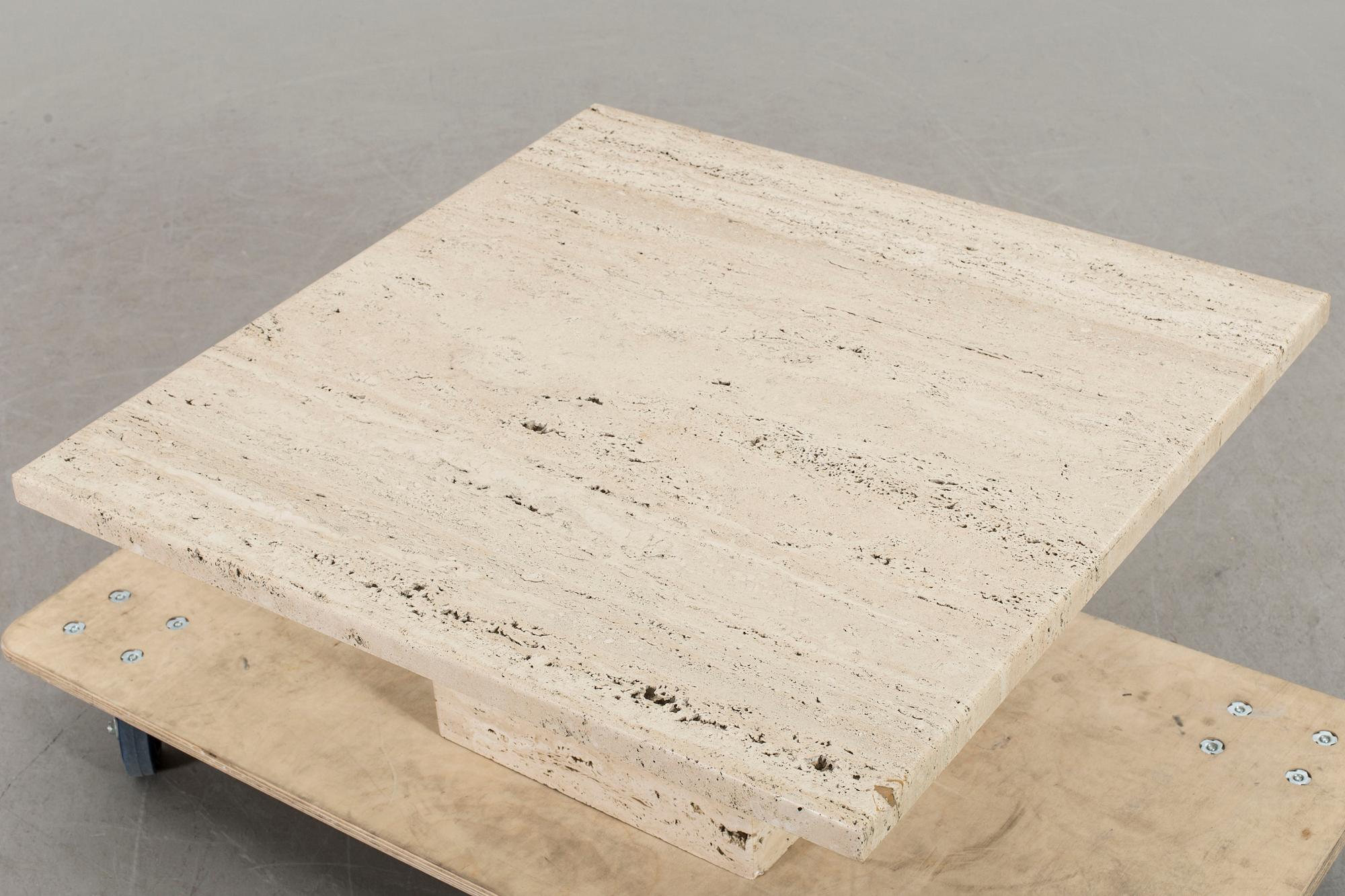 A TRAVERTINE SOFA TABLE, end of 20th century.