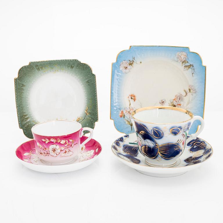 A 2-pcs set of porcelain cups with saucers, Kuznetsov and two plates, Gardner, various years 1880-1917.