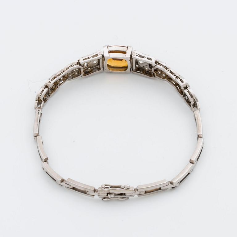 BRACELET platinum and 18K whitegold, 1 citrine, 2 old-cut and 8/8-cut diamonds approx 0,80 ct, G  Dahlgren & Co Malmö.
