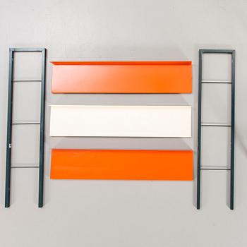 A 1950s  Adriaan Dekker lacquered metal book shelf for Tomato Holland.