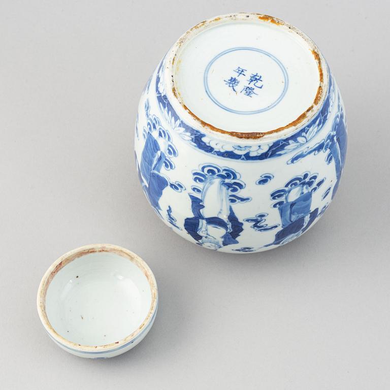 A Chinese tea pot with cover and a jar with cover, China, early 20th Century.