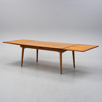 Hans J Wegner, a model 'AT-312' teak veneered dining table, Andreas Tuck, Denmark.