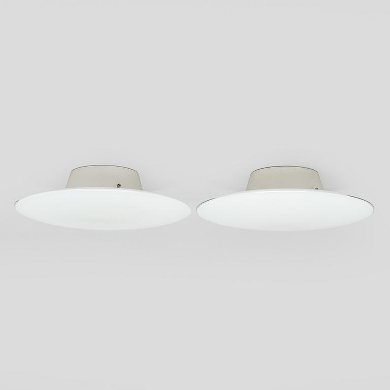 Arne Jacobsen, a pair of 1960's 'AJ-Eklipta' ceiling / wall lamps, for Louis Poulsen/licensed manufacturer Orno, Stockmann.