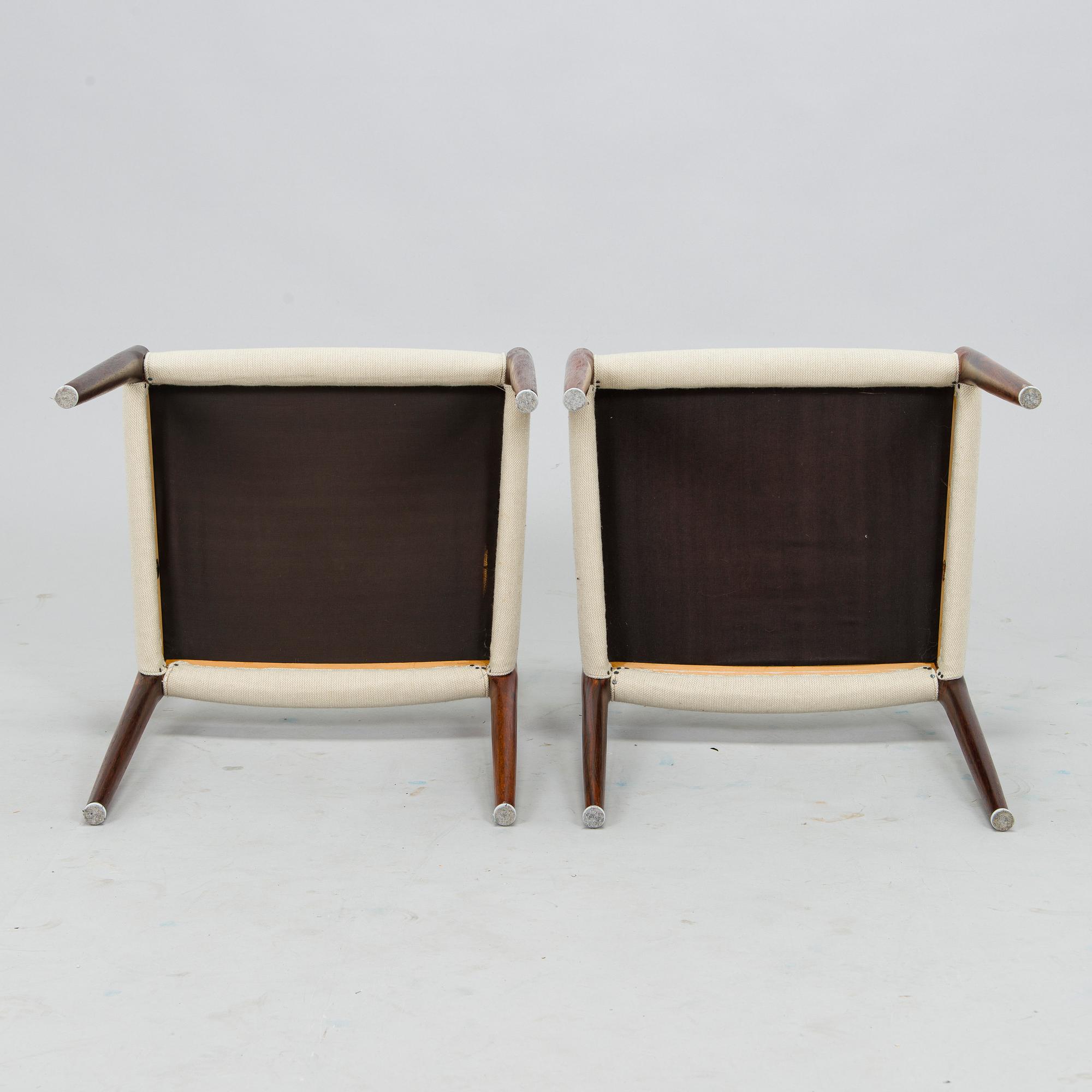 Niels Otto Møller, A 1950s dining table and six '77' chairs for J.L. Møllers Møbelfabrik Denmark.