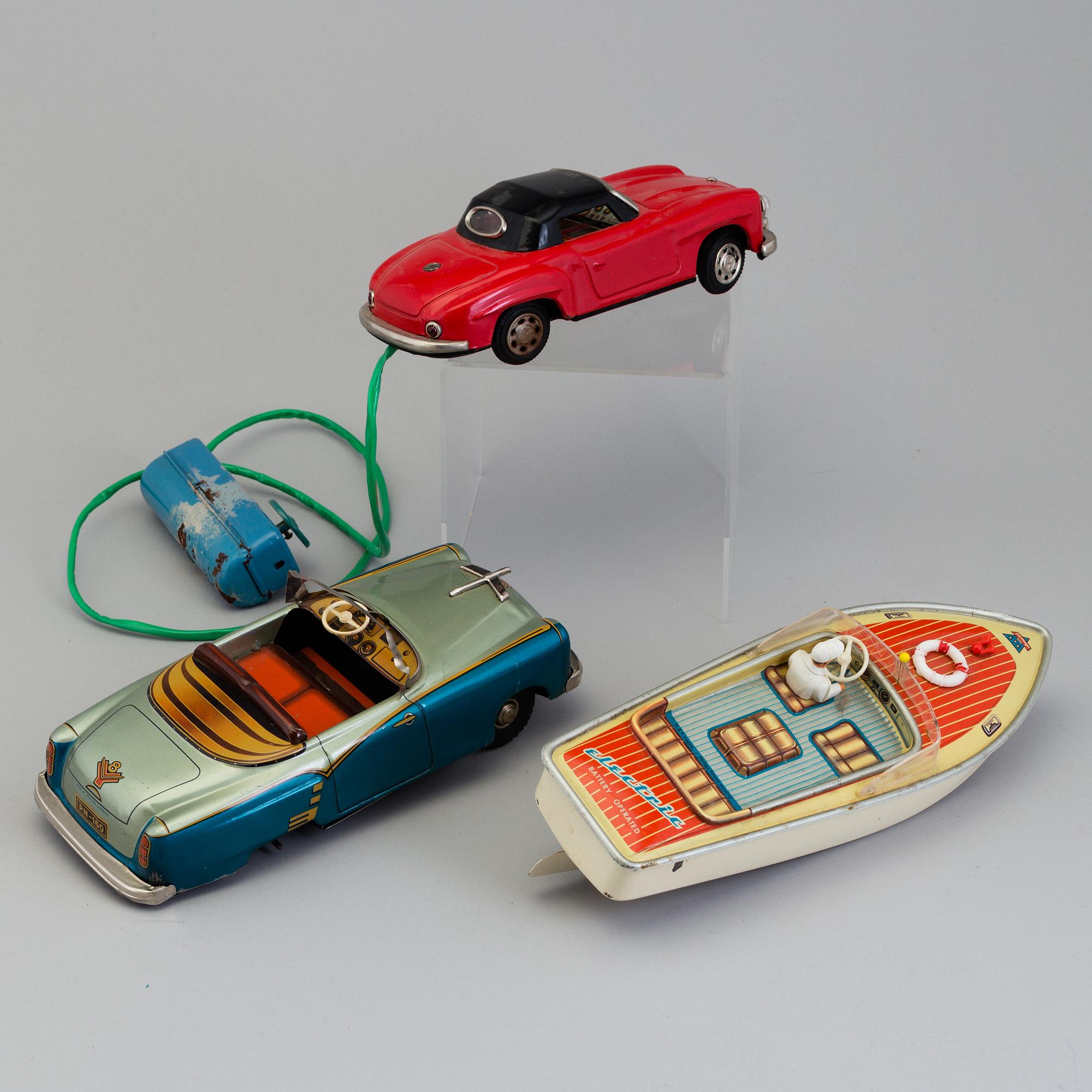 THREE TIN PLATE TOYS, mid 20th century.