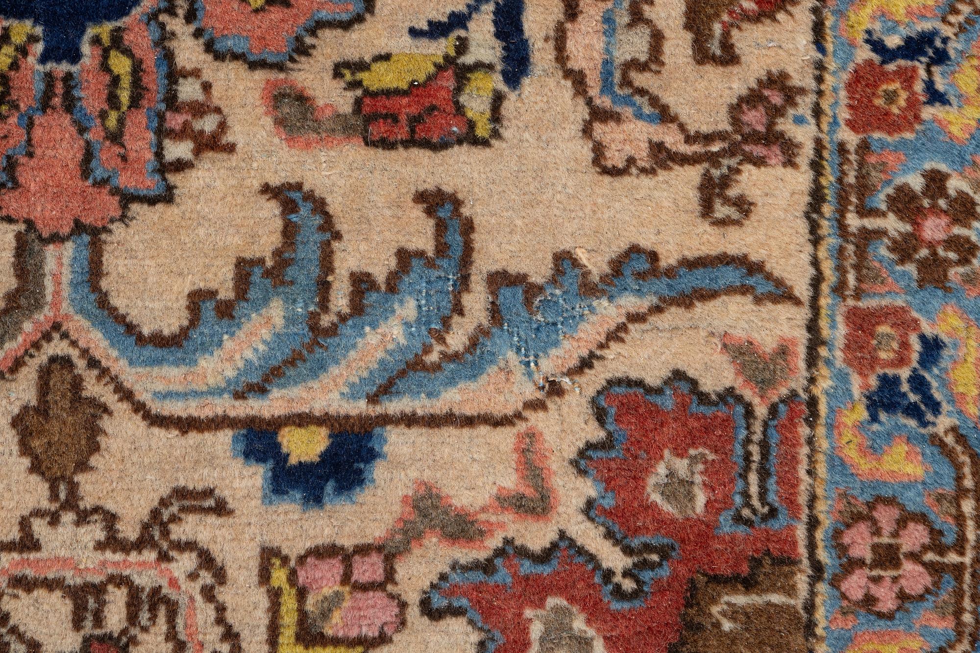 A semi antique Tabriz carpet, c. 290 x 195 cm.