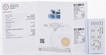 A pair of 14K gold earrings and brilliant cut diamonds.