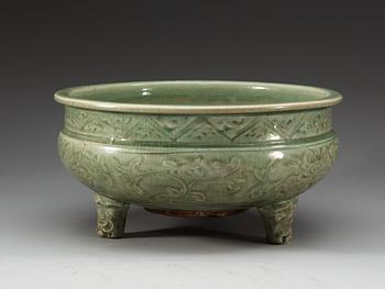 A large celadon tripod censer, Ming dynasty (1368-1644).