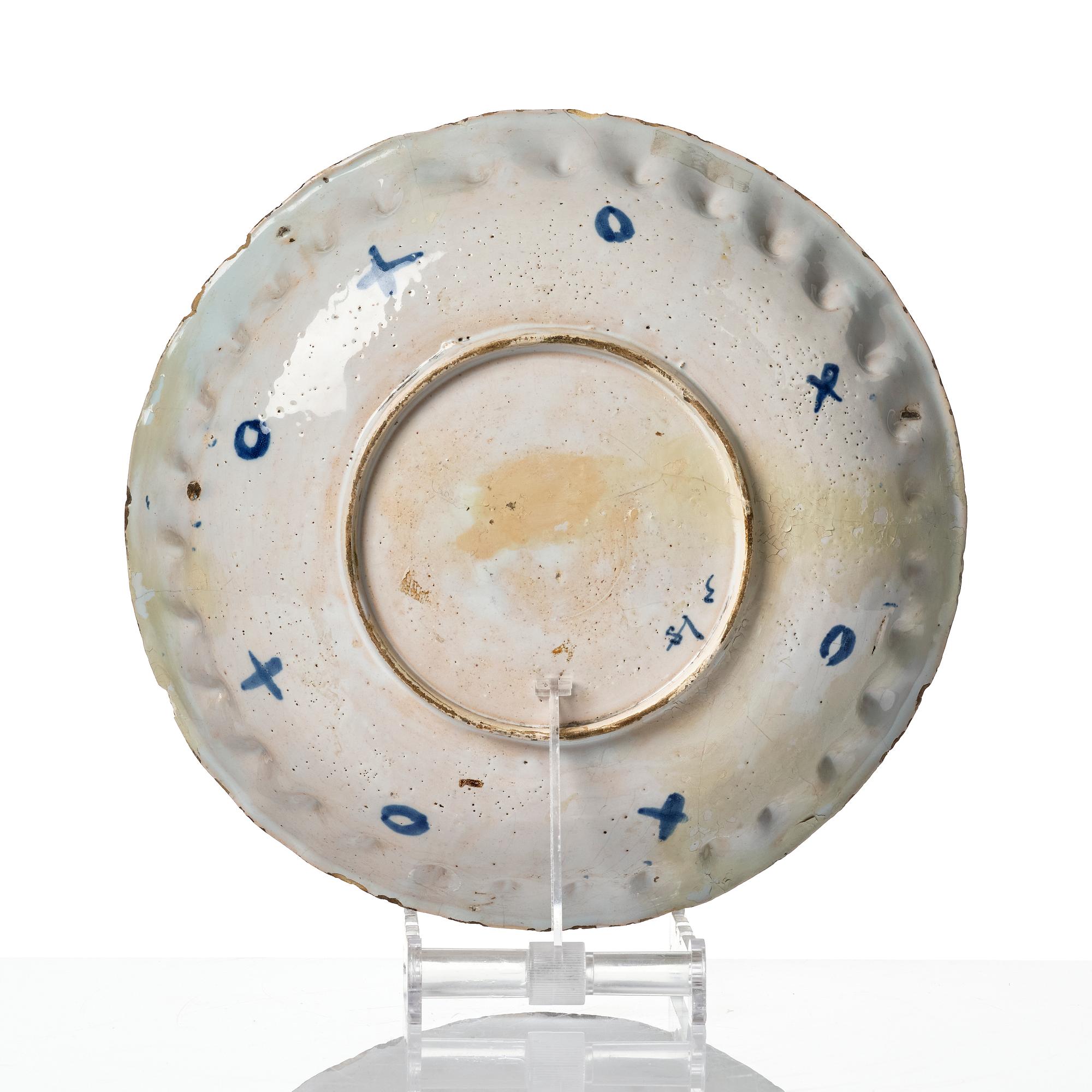 A group of three faience dishes, 18th century.