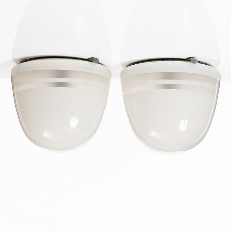Harald Notini, a pair of ceiling lamps, variant of model "10148", Arvid Böhlmarks Lampfabrik, Stockholm, 1930s.