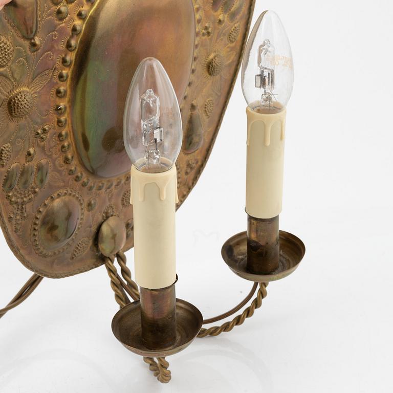 A pair of late 19th century Baroque style brass sconces.