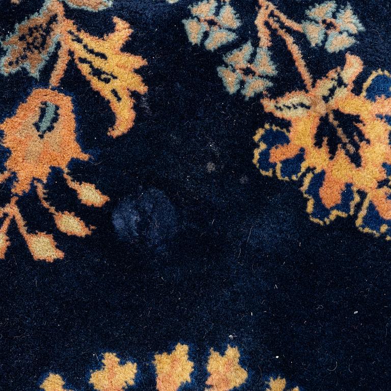 An India Carpet, c. 380 x 285 cm.