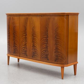 A cabinet, mid-20th Century.