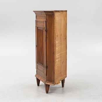 A Gustavian style pinewood corner cupboard, 19th Century.