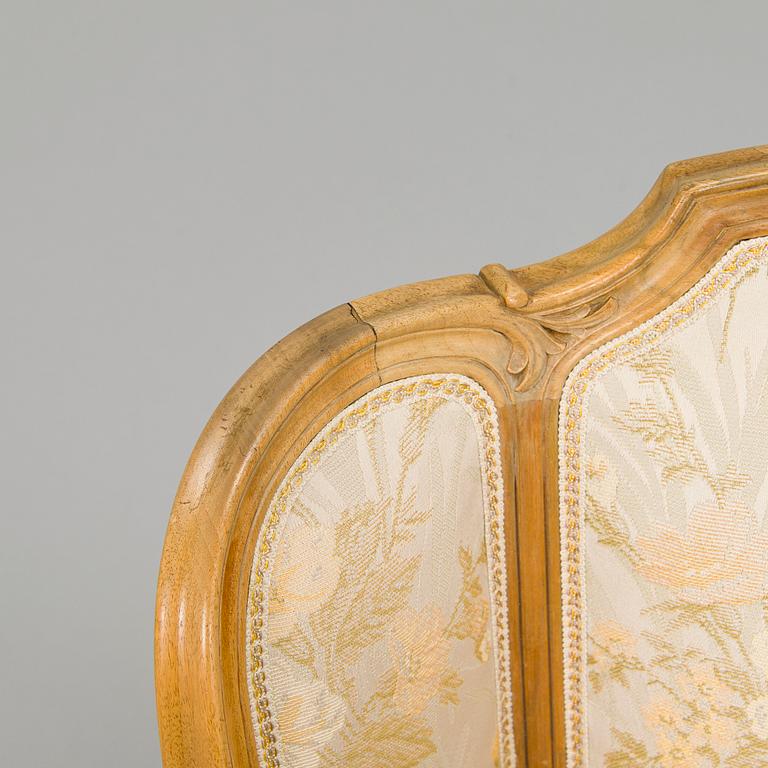 A pair of mid-20th-century French armchairs in Roccoco style.