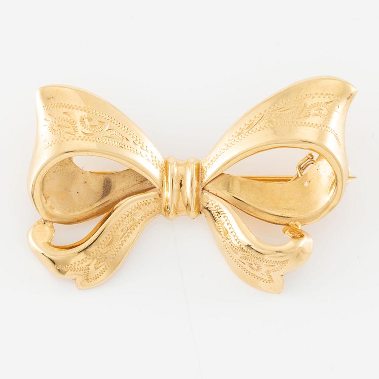 Brooch, 18K gold, bow.