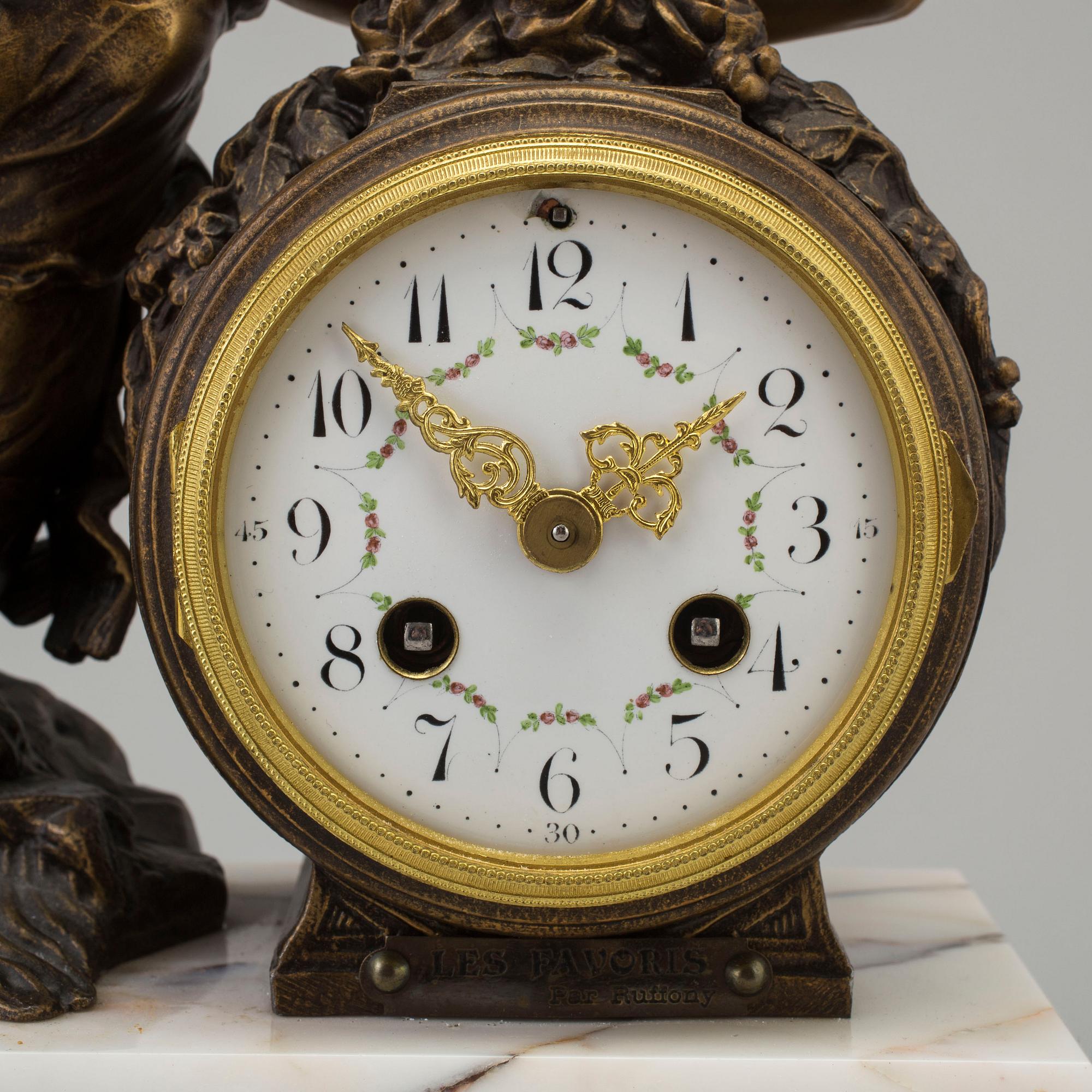 a circa 1900 mantle clock, marked Ruffony.