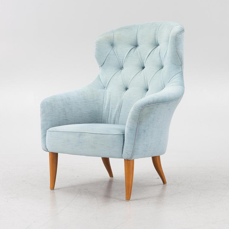 Kerstin Hörlin-Holmquist, an 'Onkel Adam' armchair, Triva series, Nordiska Kompaniet's workshops in Nyköping.