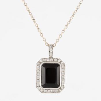 Pendant in 18K white gold set with brilliant-cut diamonds and likely onyx, with chain.