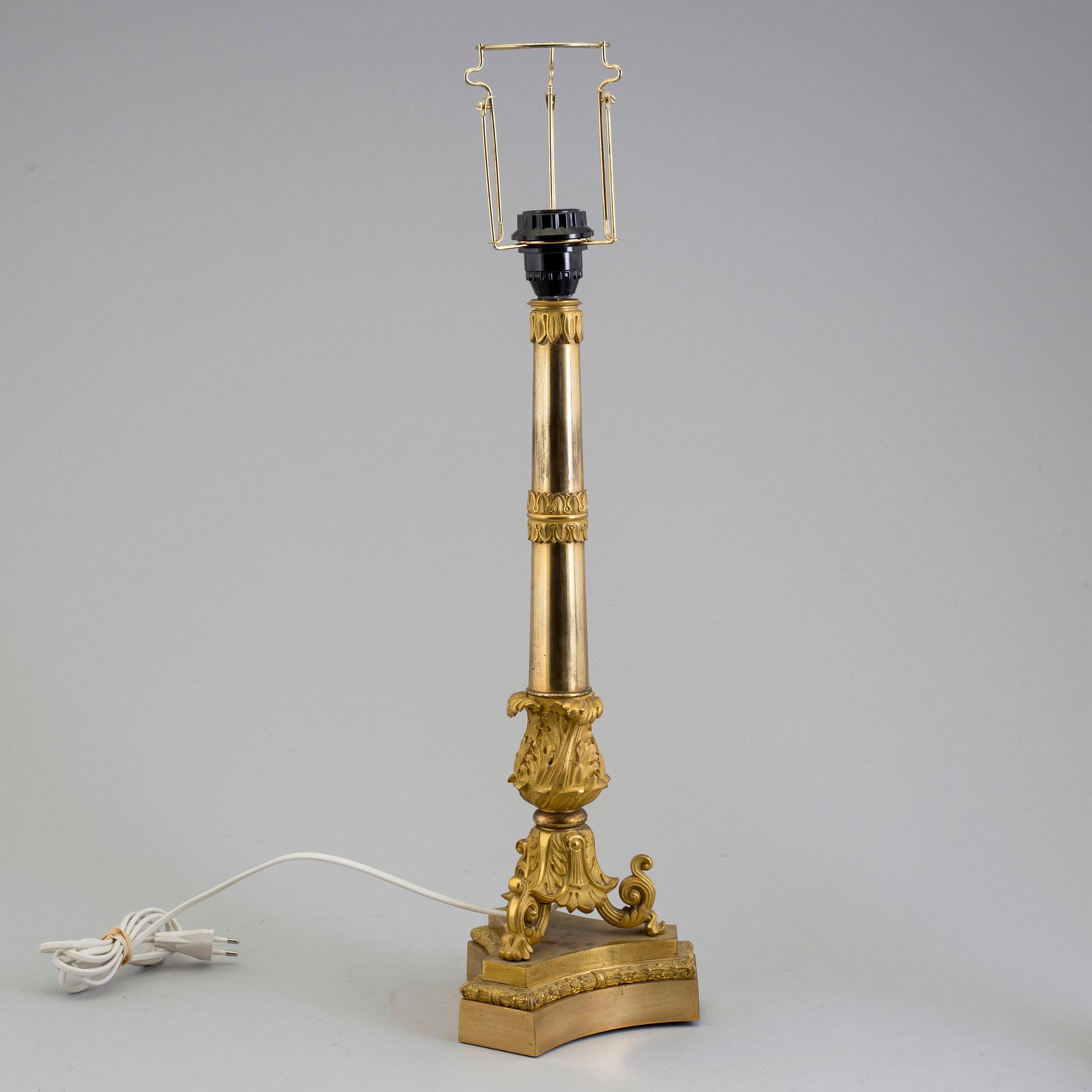 A LATE EMPIRE ORMOLU TABLE LAMP, mid 19th century.