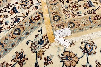 A part silk Nain carpet, 9 LA, a. 398 x 289 cm.