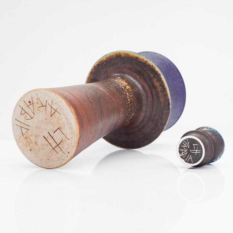 Liisa Hallamaa, a ceramic vase and three candleholders, signed LH Arabia.