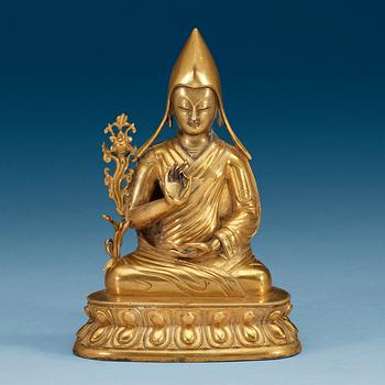 A gilt bronze figure of Seventh Dalai Lama, Lobzang Kalzang Gyatso, Qing dynasty (1644-1912).