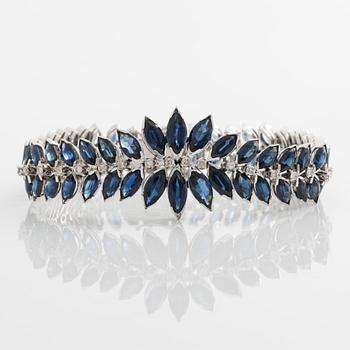 Bracelet 18K white gold with navette-cut sapphires and eight-cut diamonds.
