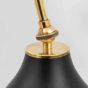 A bras wall lamp later part of the 20th century.