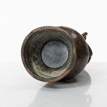 A Chinese bronze vase, Ming dynasty (1368-1644).