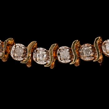 ARMBAND, sk tennisarmband, 14k guld med diamanter tot ca0,46ct. Vikt 5,7g.