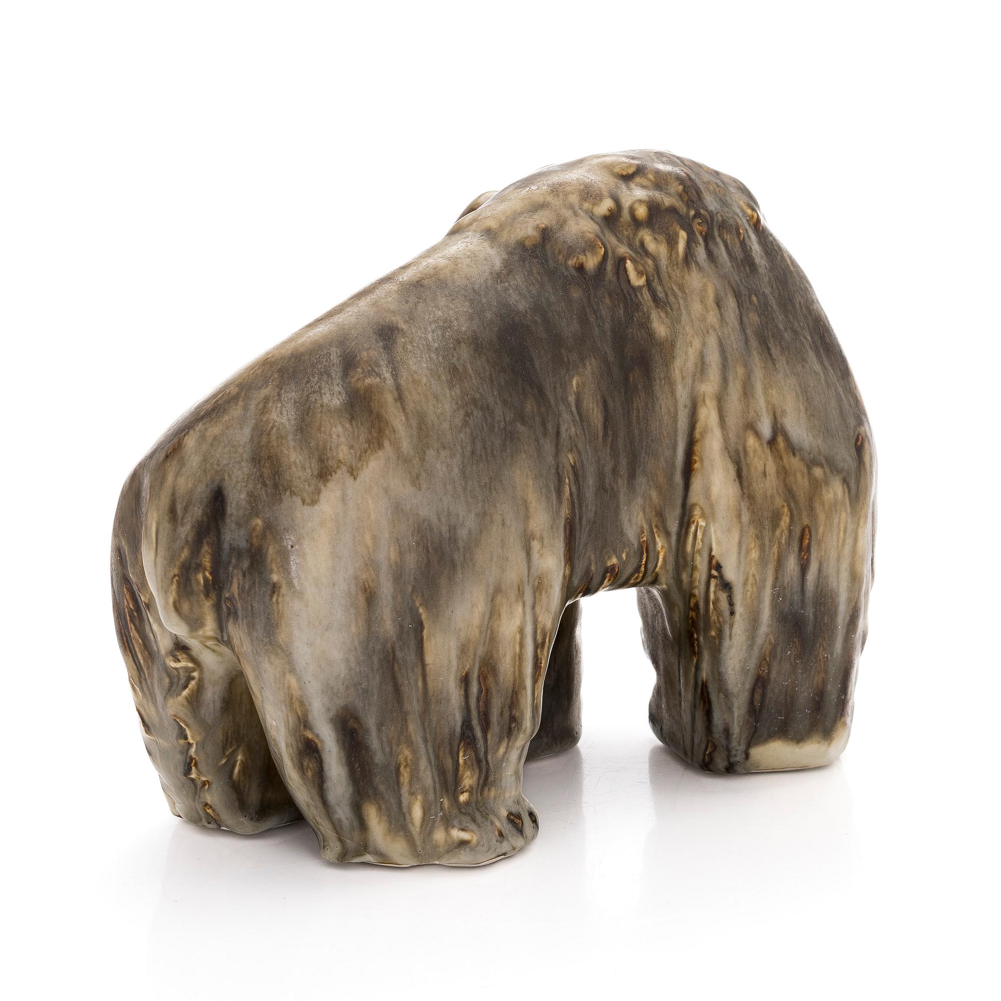 Taisto Kaasinen, a stoneware sculpture, signed T. Kaasinen Arabia Finland.