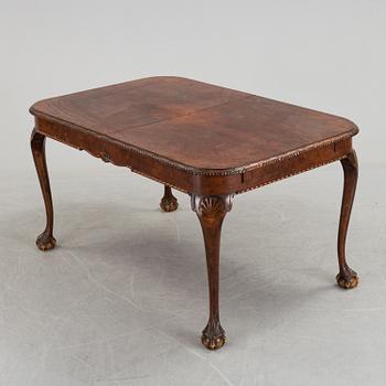 A 1920's 7 piece Chippendale-style dining group.