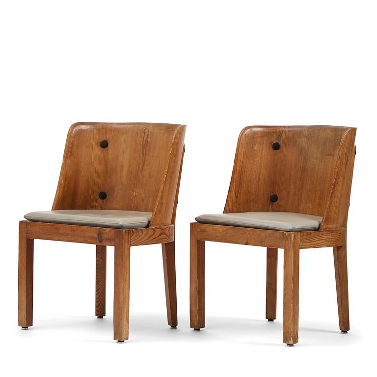 Axel Einar Hjorth, a pair of stained pine "Lovö" armchairs, Nordiska Kompaniet, Sweden, 1930s.