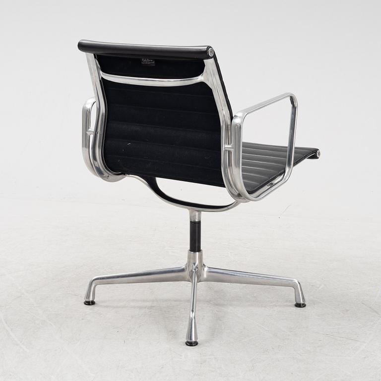 An EA 108 swivel office chair by Charles and Ray Eames for Vitra.