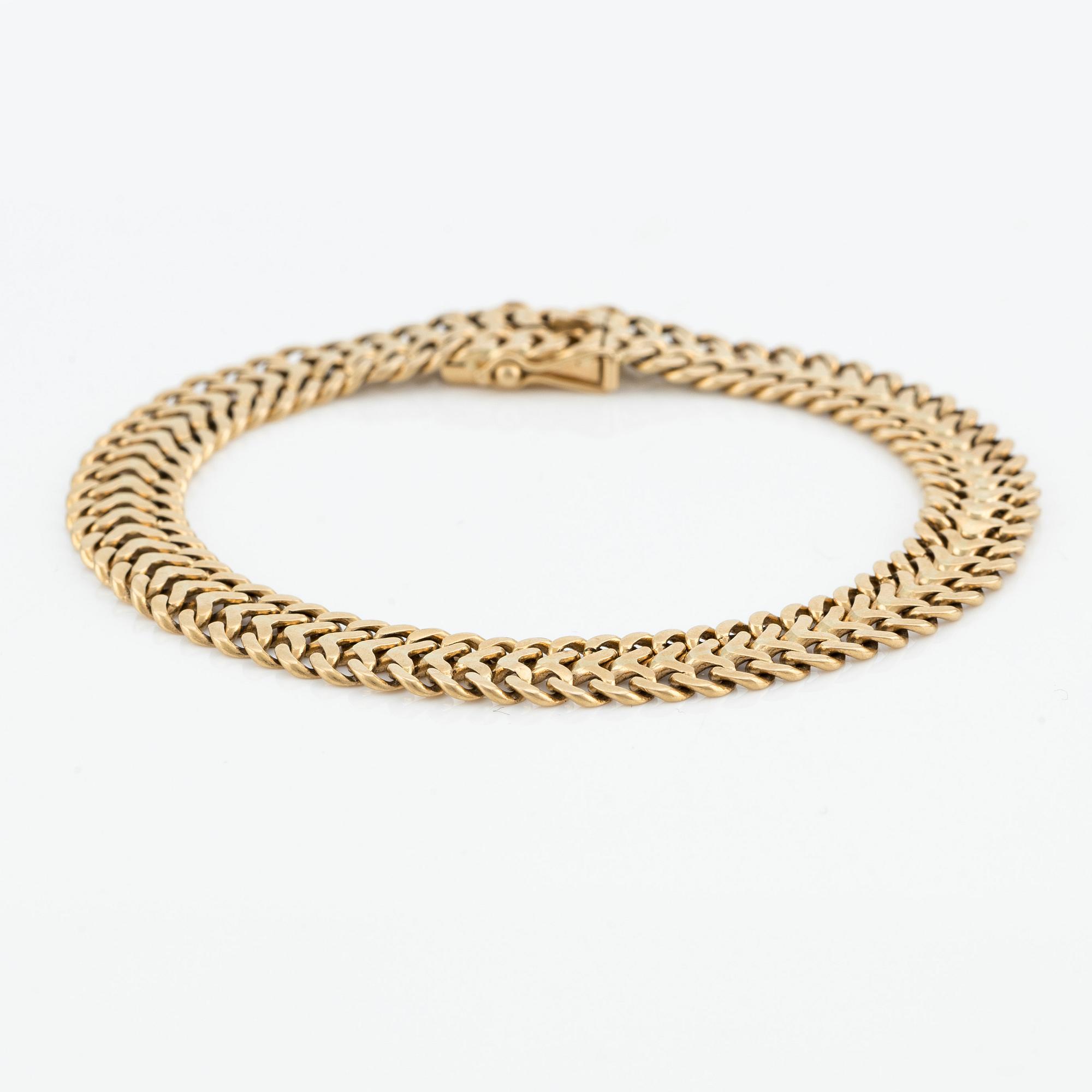 Armlänk, 18K guld, fiskbenslänk.