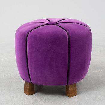 A 1940's table with pouf.