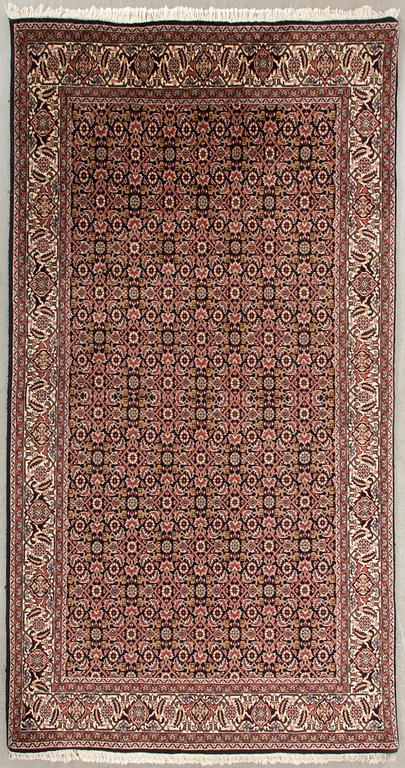 An old Bidjar carpet ca 243 x 139 cm.