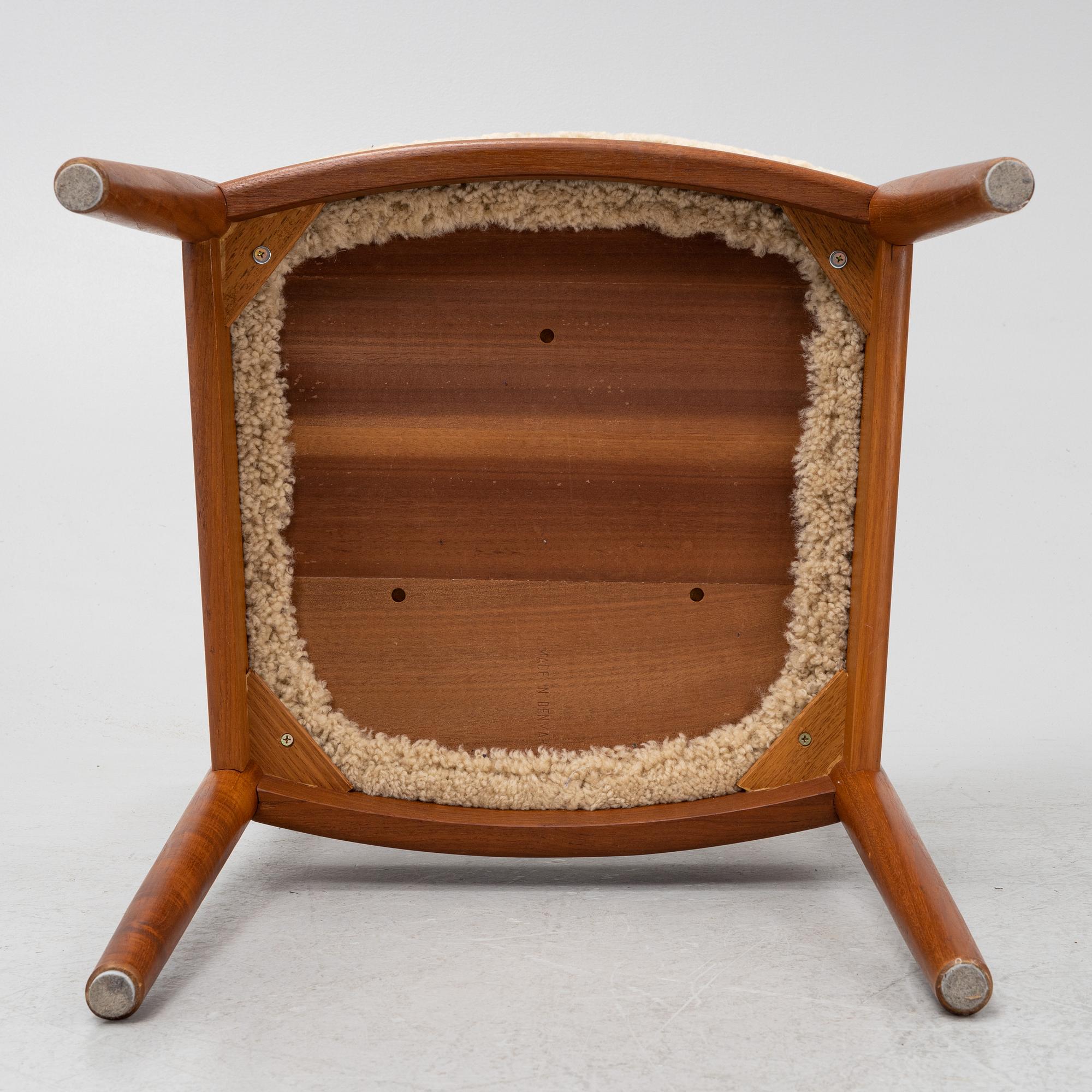A set of six teak dining chairs upholstered in new sheepskin by Niels Koefoed, Denmark, 1960's.