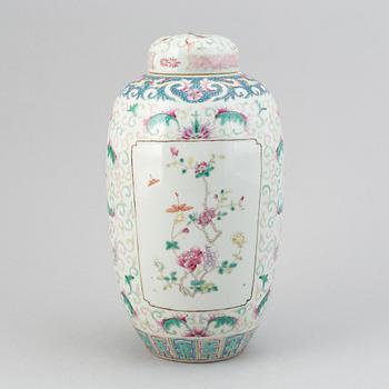 A chinese famille rose lotus jar with cover, 20th Century.