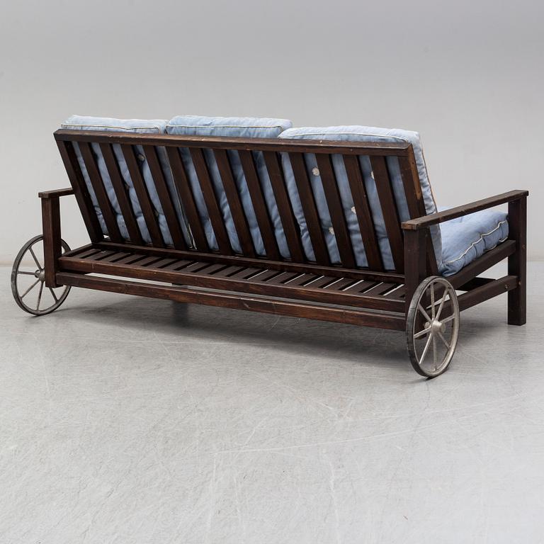 ELSA STACKELBERG, a garden sofa from the second half of the 20th century.