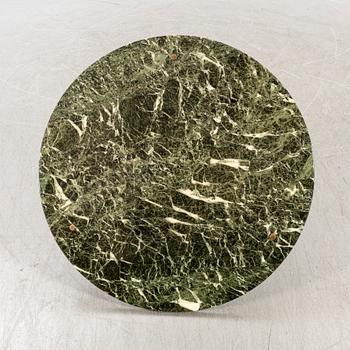 A marble coffee table alter part of the 20th century.