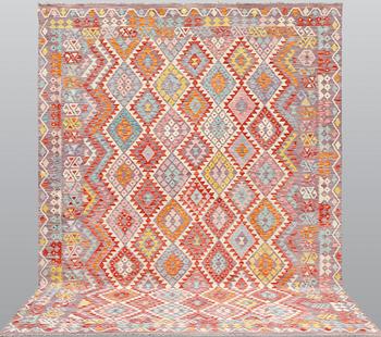 A kilim carpet ca 338 x 256 cm.
