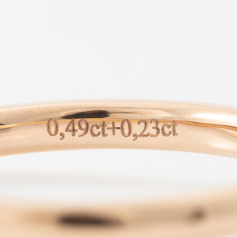 Ring 18K guld med briljantslipad diamant. Medföljande IGI report.