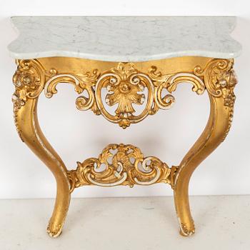 A Rococo revival mirror and a console table, second half of the 20th Century.