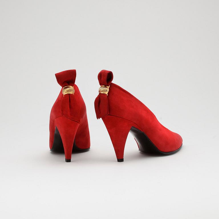 CHARLES JOURDAN, a pair of red suede pumps with matching shoulder bag.