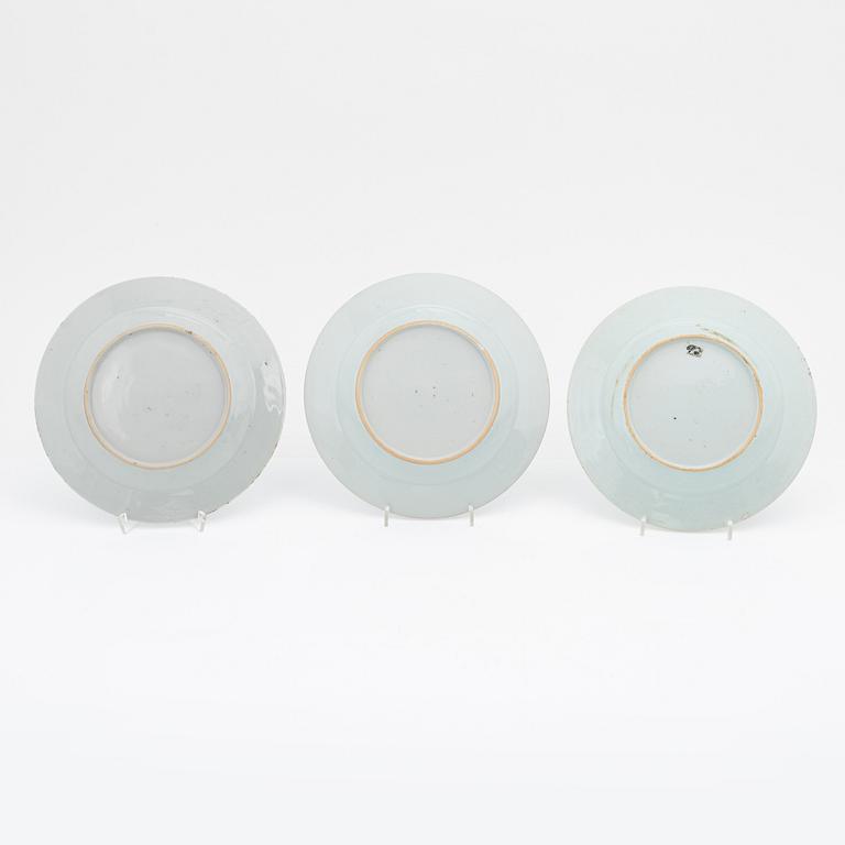 A blue and white serving dish and eight odd plates, Qing dynasty, 18th Century.