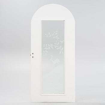 Glössner & Co, a signed glass door.