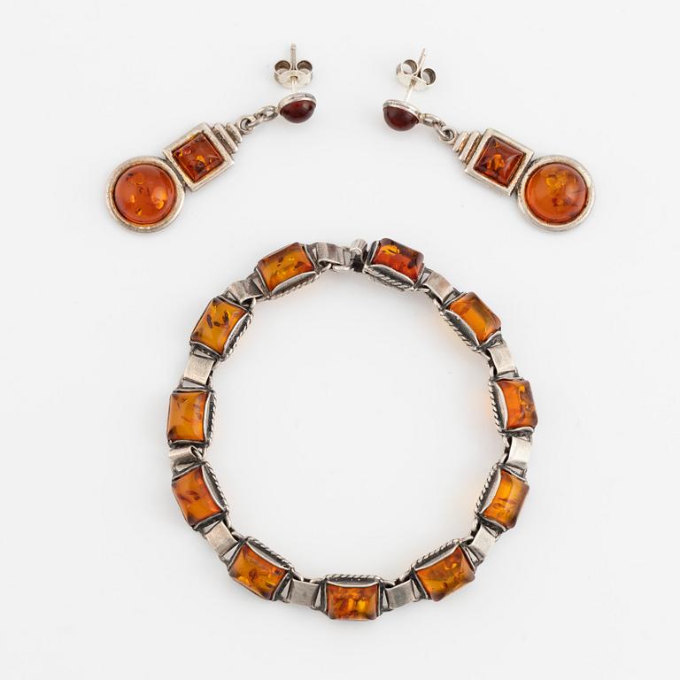 Silver and amber bracelet and earrings.