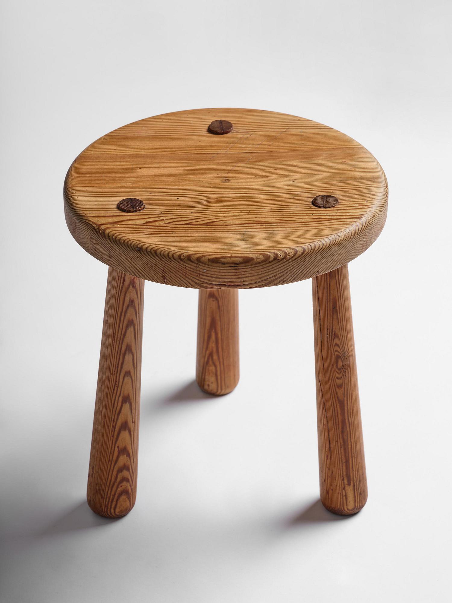 Axel Einar Hjorth, a stained pine "Skoga" stool, Nordiska Kompaniet, Sweden, 1930s.